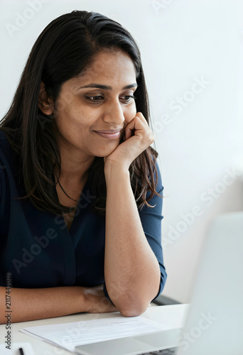Smiling young indian woman ...