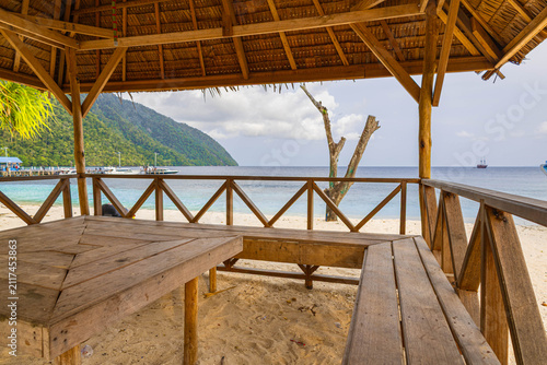 Принти на полотні The beach scene with gazebo on the beach under palm tree