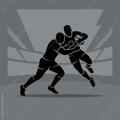 Dynamic Rugby Players In Action Capturing The Intensity Of A Tackle