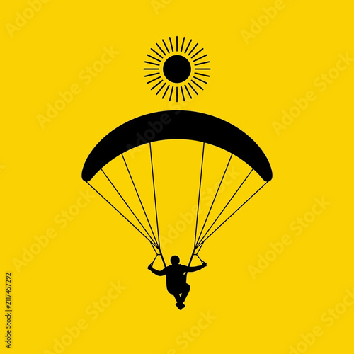 Dynamic Paraglider Silhouette Against Sunny Sky Energetic Adventure