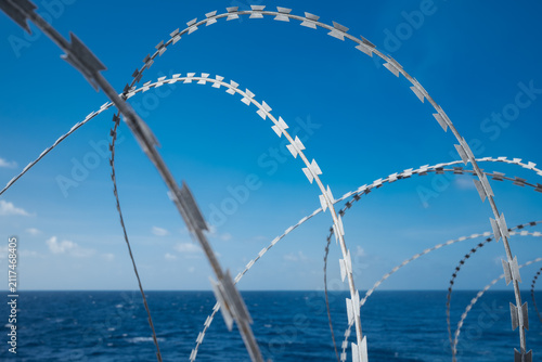фотографія Razor Wire Security Barrier on Oil Tanker Deck for Anti Piracy Protection at Sea