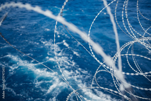 Принти на полотні Razor Wire Security Barrier on Oil Tanker Deck for Anti Piracy Protection at Sea