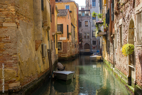 Принти на полотні narrow canal with in Venice in Italy