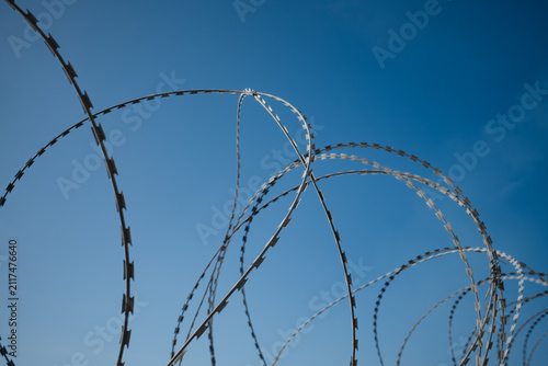 Obraz na plátně Razor Wire Security Barrier on Oil Tanker Deck for Anti Piracy Protection at Sea