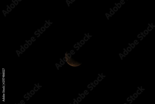 Obraz na plátně Deep space close-up capturing a dark, detailed crescent moon in total darkness