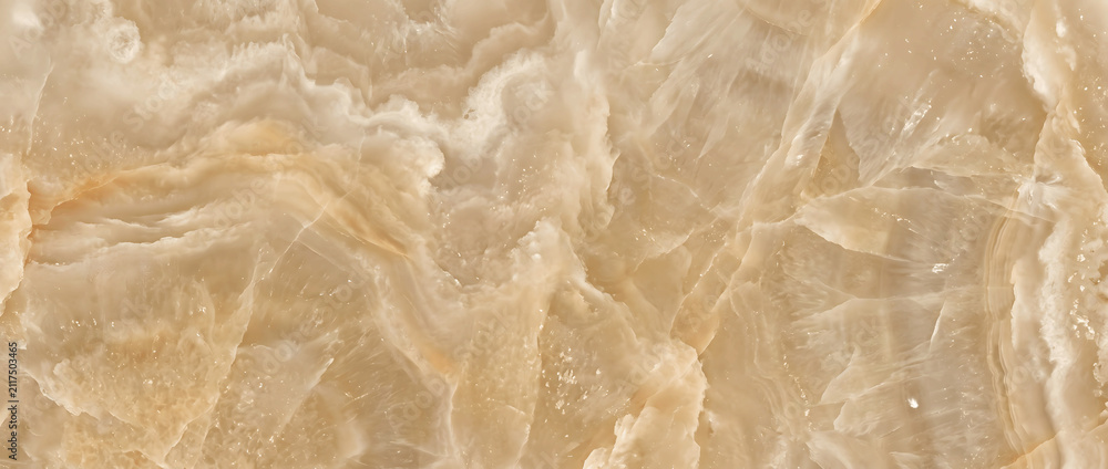 Fototapeta premium Marble texture featuring a spectacular blend of light beige honey onyx stone layers with complex natural fractures creates an elegant luxury backdrop for modern upscale branding designs