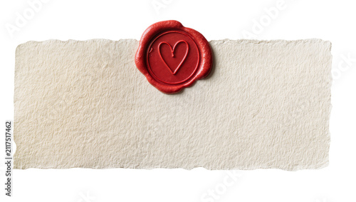 Red wax seal with heart imprint on torn parchment paper, isolated on transparent background