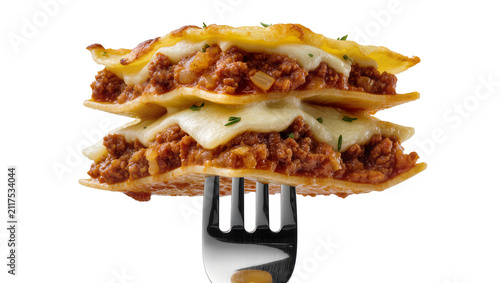 Принти на полотні Layered beef lasagna with melted cheese and herbs impaled on a fork, isolated on