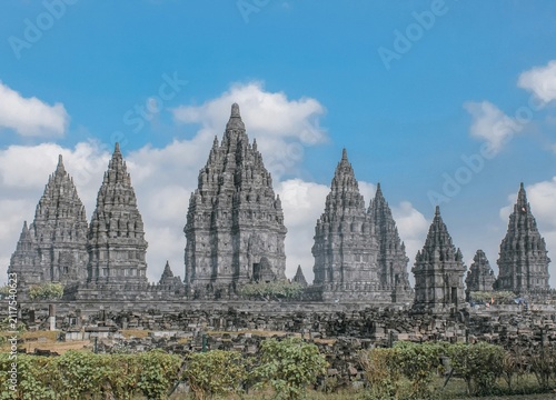 Cuadro en lienzo prambanan temple ancient hindu compound tall stone spire blue sky cloud
