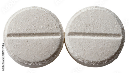 Fotografie Two white round pills with a dividing line, isolated on transparent background