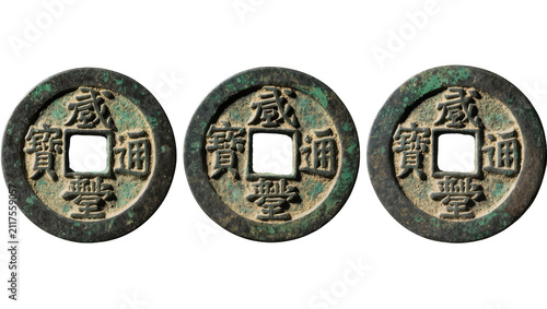 Three antique Chinese bronze coins with square holes, isolated on transparent background