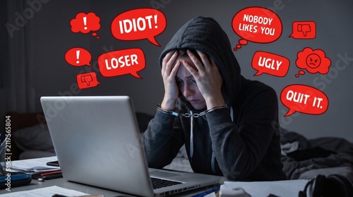 Teenager experiencing cyberbullying and online harassment while using a laptop.