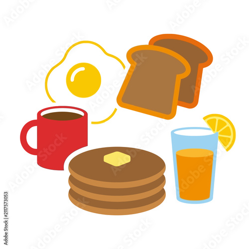 A classic American breakfast spread with pancakes, eggs, toast and coffee