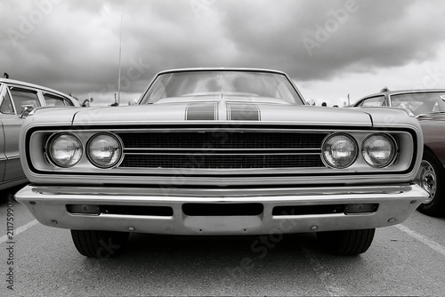 The Classic Front View of a 1960s Muscle Car in Chrome Shine