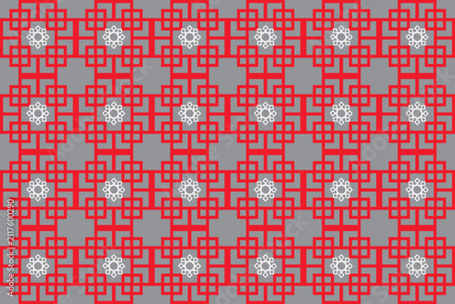 This image shows a traditional Thai fabric with an intricate geometric pattern. 