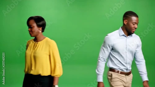 Green Screen Black Man and Woman Walking Into Frame and Pointing at Camera on 2D Flat Background