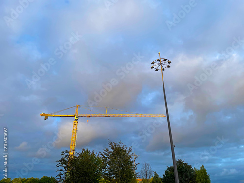 The modern city of Almere in a bright blue cloudy sky, at sunset  Almere, Flevoland, the Netherlands, July, 2026