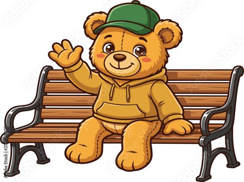 Cute brown teddy bear wearing a green cap and yellow hoodie sitting on a bench