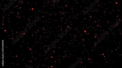 Orange Particles Floating On Black Background