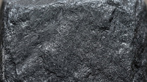 Seamless dark carbon fiber texture background. High-resolution black woven pattern for modern design projects.