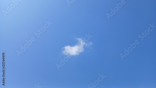 Canvas Print White foamy cloud on pure blue sky, blue sky with clouds.