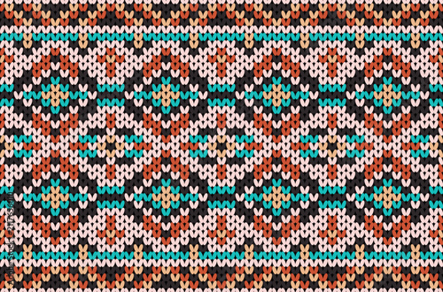 Seamless black, coral, blush pink, turquoise and beige knitted pattern featuring geometric diamonds and folk-inspired winter sweater texture for fabric, textile design.