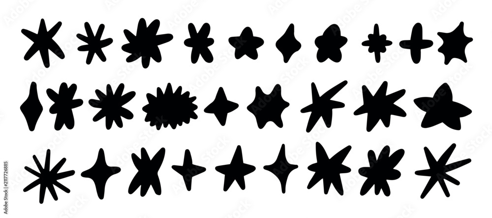 Fototapeta premium Doodle drawn star icons set. Black organic shine star burst symbol. Silhouettes vector set in flat style