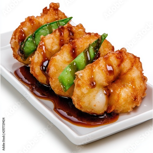 Golden Breaded Shrimp Appetizer with Dark Glaze and Pea Shoots
