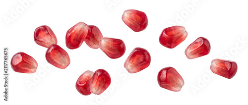 Fotografie Pomegranate seeds scattered, isolated on transparent background
