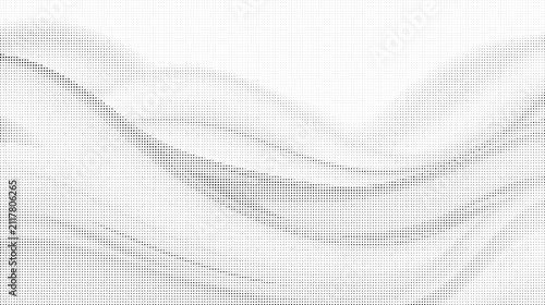 Abstract black and white halftone dot pattern creating a gradient effect on a clean background
