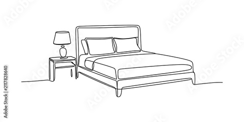 Foto Continuous single line drawing of a bed with a lamp on a nightstand