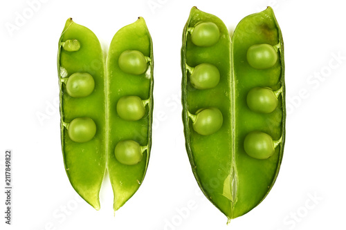 A studio close-up of opened green pea pods displaying fresh peas against a white background