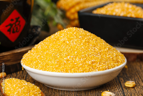 Canvastavla Nutritious Yellow Corn Meal Grits in White Bowl - Traditional Cooking Ingredient