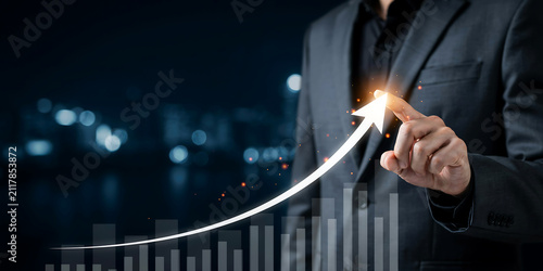 Close up of entrepreneur hand indicating upward trend line representing business financial progress with business investment strategy professional marketing corporate management development