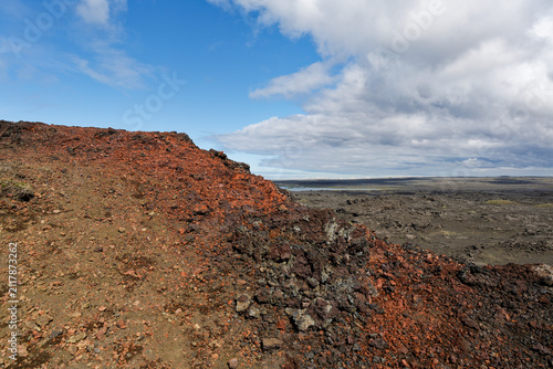 Obraz na plátně Vibrant Red Volcanic Scoria and Lava Field Landscape