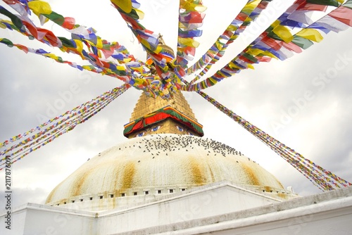 Boudhanath Stupa with Colorful Tibetan Buddhist Prayer Flags in Kathmandu, Nepal