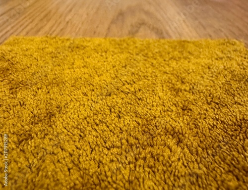 Closeup Of Plush Shag Rug Showcasing Detailed Fibers And Warm Lighting Effects