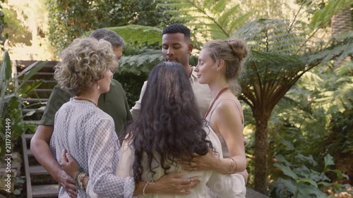 People hugs in circle with solidarity and gratitude 