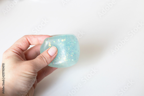 Hand squeezing glittering squishy toy for stress relief