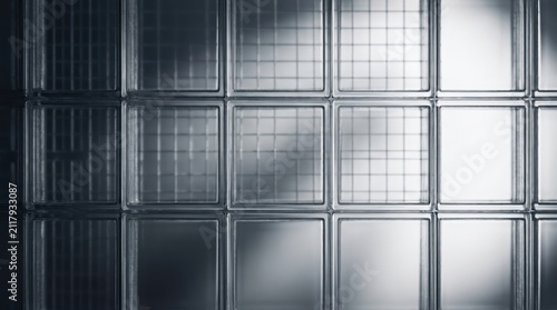 Abstract Glass Block Wall with Grid Pattern and Light Reflection