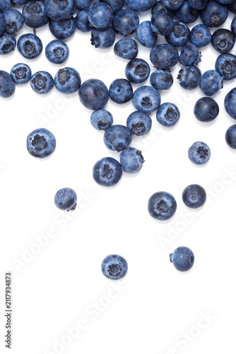 Fresh organic blueberries on a white background.