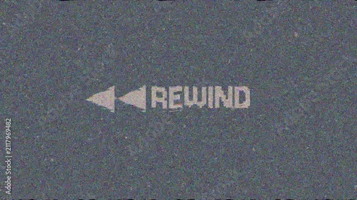 Retro VHS Rewind Text on TV Static Noise Background with Glitch Effect. 4K Video