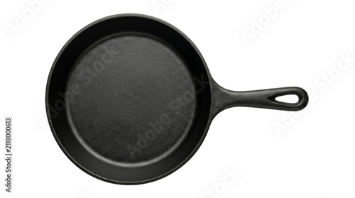 Cast iron skillet top view on white background: cooking essentials