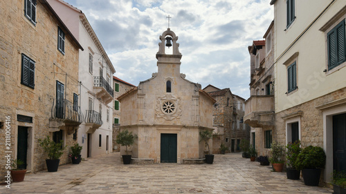 Historic Saint John square and octagonal church in Jelsa town, Hvar Island, Croatia