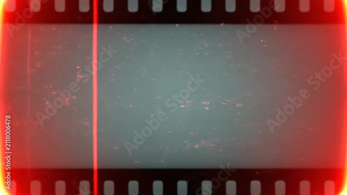 A vintage film frame with red light leaks and dust