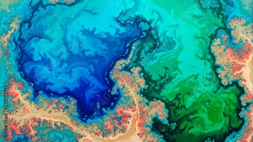 Abstract fluid art with vibrant blue and green swirling colors
