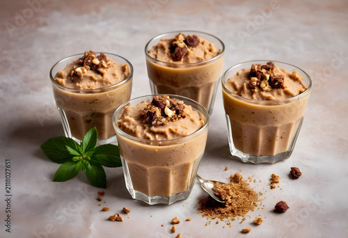 Four glasses of creamy bana...