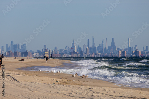 Sandy Hook Beach and Manhattan Skyline with Rough Surf