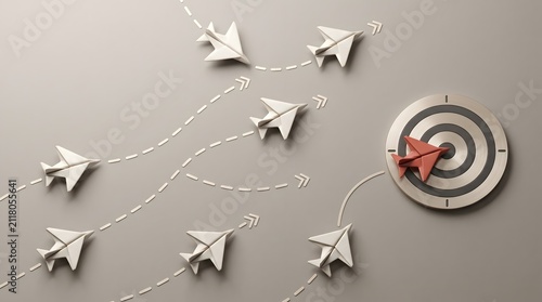 Strategic focus and leadership concept with a red paper plane hitting a target while white planes follow divergent paths