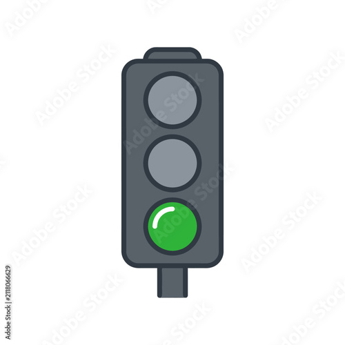 Traffic light signal displaying a bright green light.